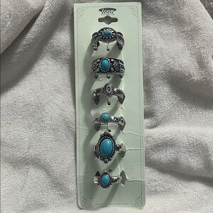 Costume silver and turquoise stretch rings.  Never worn